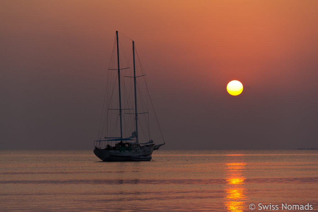 Sonne mit Segelschiff